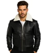 Men’s two-tone black and white leather bomber jacket featuring white leather sleeves, black body, and striped ribbed collar and cuffs.