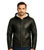 A product video of a black leather bomber jacket featuring a detachable fabric hood, ribbed-knit trim, and a classic zip-front closure.