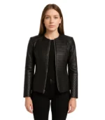 Women’s Nexi Obsidian Shield black leather jacket featuring full-body diamond quilting, asymmetrical silver zipper, and reinforced shoulder panels.