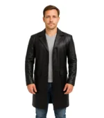 A men’s long-length black leather coat crafted from heavy-duty cowhide, featuring a classic structured design and a polished finish.