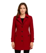 A sophisticated woman wearing a tailored 3/4 length single-breasted wool coat with a professional lapel collar and structured fit.