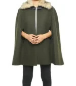 Women’s chic olive green cape coat made from a wool blend, featuring a flowing silhouette, structured shoulders, and a sophisticated button front.