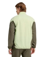 This view helps buyers judge the men’s fit and sporty collar look. Pair it with neutral bottoms to keep the outfit clean and let the lime green stand out. Great for warm-ups and daily use.