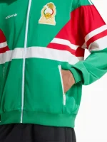 Front view of Mexico 1986 adidas track jacket showing zipper, stand collar and clean retro look in green.