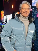 High-gloss blue puffer jacket worn by Andy Cohen on New Year's Eve 2026.