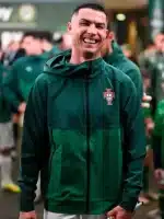 Portugal green hooded training jacket with zip front and crest-style chest detail for a sporty 2026 qualifier look.