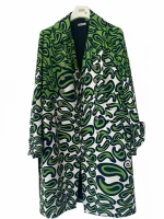 Printed green coat inspired by Emily in Paris S03 with clean street style