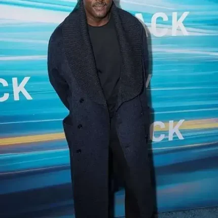 Idris Elba navy blue wool coat showing long overcoat style, clean lapels and winter-ready fit