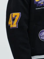 This close-up focuses on the patchwork and stitching quality. It helps customers see the texture, edges, and placement up close, making it easier to judge the look before ordering.