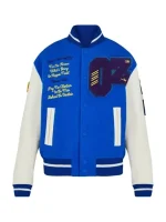 Front view of blue and white Wizard of Oz varsity jacket with wool body, leather sleeves, and snap button closure.