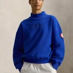 Women’s Team USA blue mockneck sweatshirt showing fleece look and relaxed winter fit