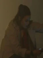 Back view of Lina Esco The Rip 2026 trench coat, showcasing clean lines and belted waist