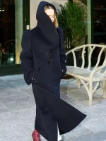 Front view of Emilia Clarke blue wool coat with hood and stylish design