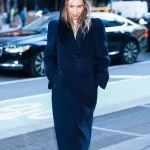 Emilia Clarke blue hooded coat for winter warmth and style