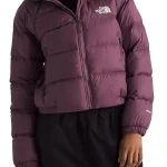 Front view of women’s maroon puffer jacket with hooded style, zip closure, and warm padded winter panels.