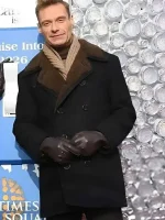 Ryan Seacrest black shearling-style peacoat showing warm inner feel and sharp outer look for winter wear