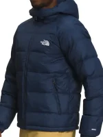 Side view of Hydrenalite blue puffer jacket showing hood shape, sleeve fit, and padded profile.