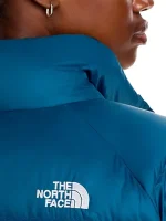 Side view of Hydrenalite teal blue puffer jacket showing hood shape, sleeve fit, and padded winter profile.