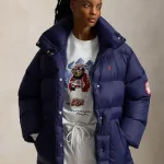 Winter Olympics 2026 Team USA navy down puffer jacket showing padded winter look and clean sporty style