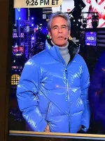 Detailed close-up of the metallic blue fabric on the Andy Cohen puffer jacket.