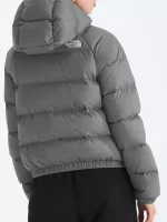 Back view of women’s Hydrenalite grey puffer jacket showing full coverage, hood, and clean winter silhouette.