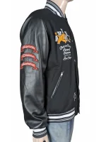 Amiri logo patch varsity jacket right sleeve detail view