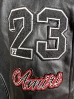 Amiri logo patch varsity jacket right sleeve detail view