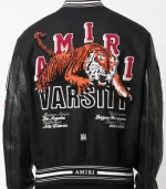 Amiri logo patch varsity jacket back view with clean varsity fit