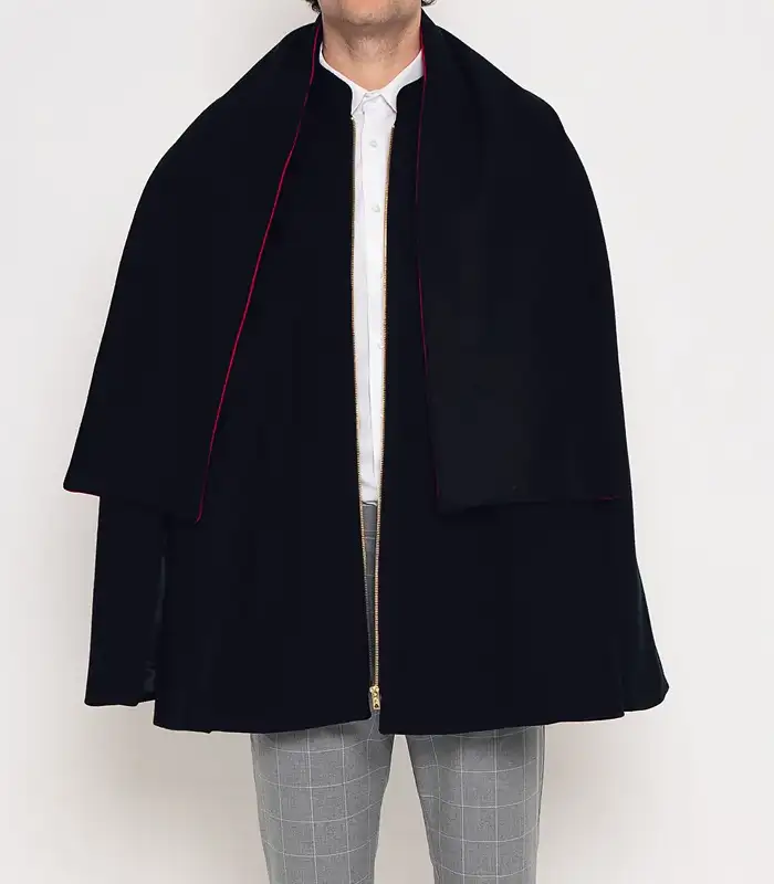 Mens Byron Black Wool Cape Mens Byron Black Wool Cape with clean black wool drape, stand up collar, and refined cape shape