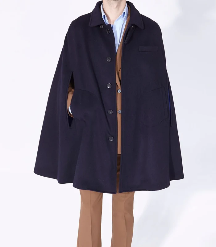 Mr Darcy Navy Wool Cape Mr Darcy Navy Wool Cape with navy wool body, satin lining, button front, and timeless cape silhouette